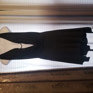 Sexy sleeveless black dress w lowcut front & low cut openback w crisscross strap